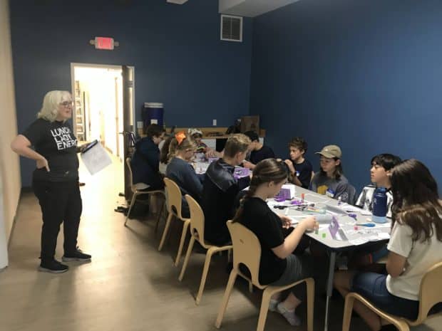 Volunteer Coordinator Debbie Explaining the next project to the group.